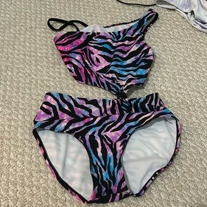 More than magic leopard print size 10 12 one piece that connects in middle